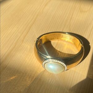 Lustrous Gold Bracelet with Pearl Centerpiece